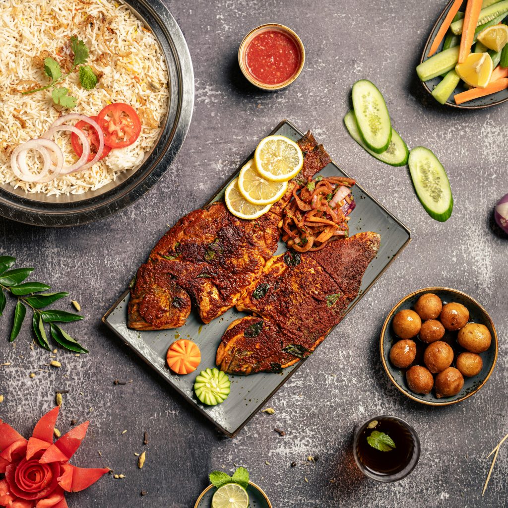 Tasty fish fry with crispy texture and bagara rice side