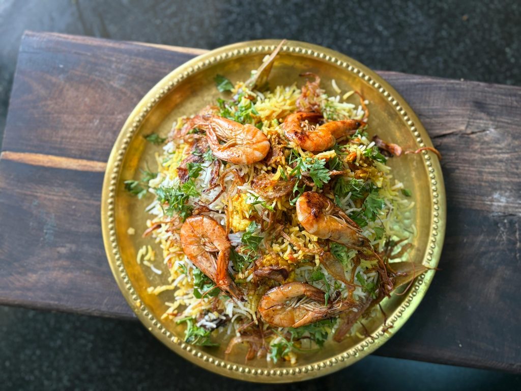 South Indian prawns biryani with spicy masala and curry leaves