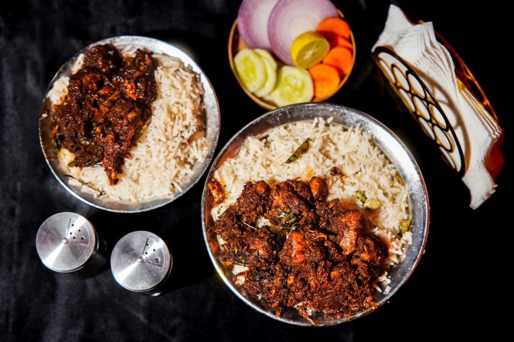Hyderabadi bagara rice with crispy chicken fry and rich spices