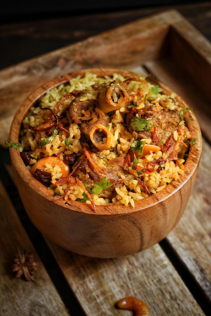 Classic Indian mutton biryani with rich gravy masala and basmati rice